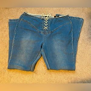 Flared jeans with laced up front
